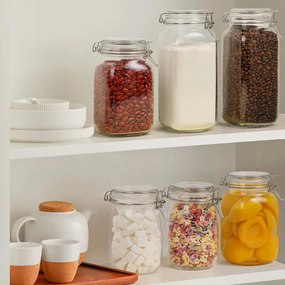 Glass storage jar with airtight clamp lid